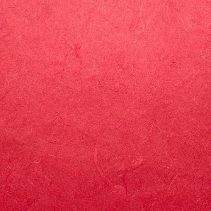Detailed view of Unryu-style mulberry paper from Kozo Studio with visible fibers and elegant handmade paper folds.