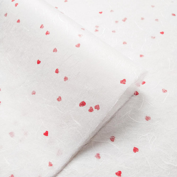Kozo Studio handmade paper design with white mulberry paper and whimsical red hearts in a delicate Unryu texture.