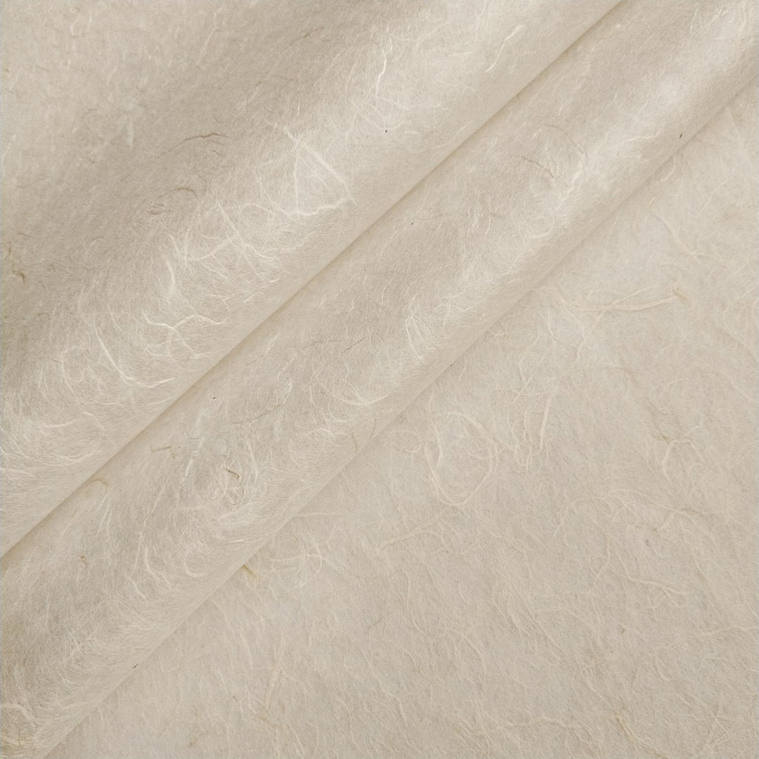 Unryu Kozo Paper by Kozo Studio showing textured handmade paper with visible mulberry fibers in natural off-white color.
