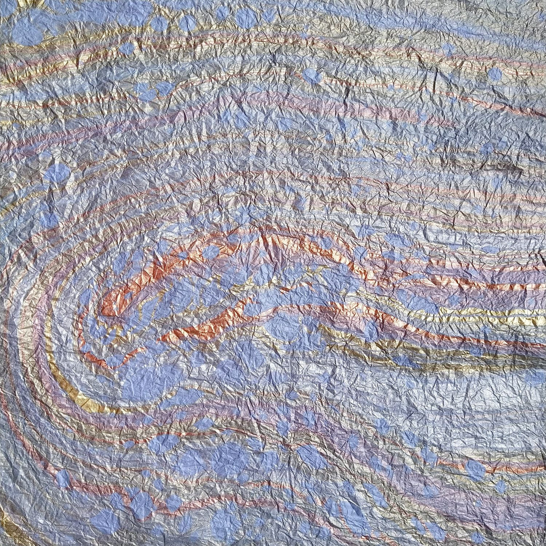 Decorative light blue marbled handmade paper created by Kozo Studio, featuring artisanal patterns on textured mulberry paper.