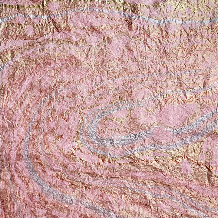 Hand-marbled Milano Kozo handmade paper in pink by Kozo Studio, using mulberry paper with a textured, soft surface ideal for artistic and craft applications.