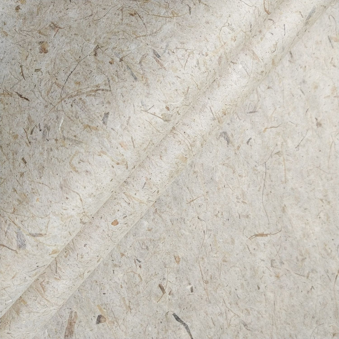 Close-up of handmade Banana Kozo paper from Kozo Studio, showcasing its fibrous mulberry paper texture blended with banana trunk for a natural, earthy look.