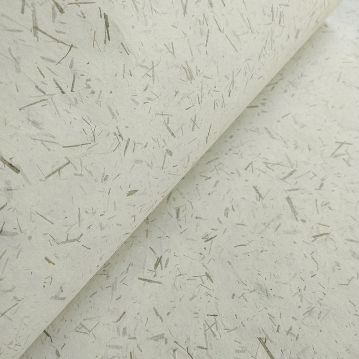 Artisan-style handmade paper made with mulberry pulp and bamboo elements by Kozo Studio, perfect for DIY and creative projects needing natural texture.