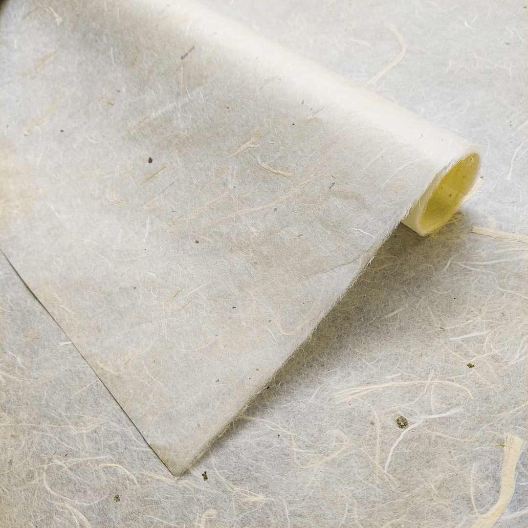 Kozo Studio mulberry paper crafted with the stiff part of kozo bark and unbleached fiber, featuring a soft off-white tone and natural texture.