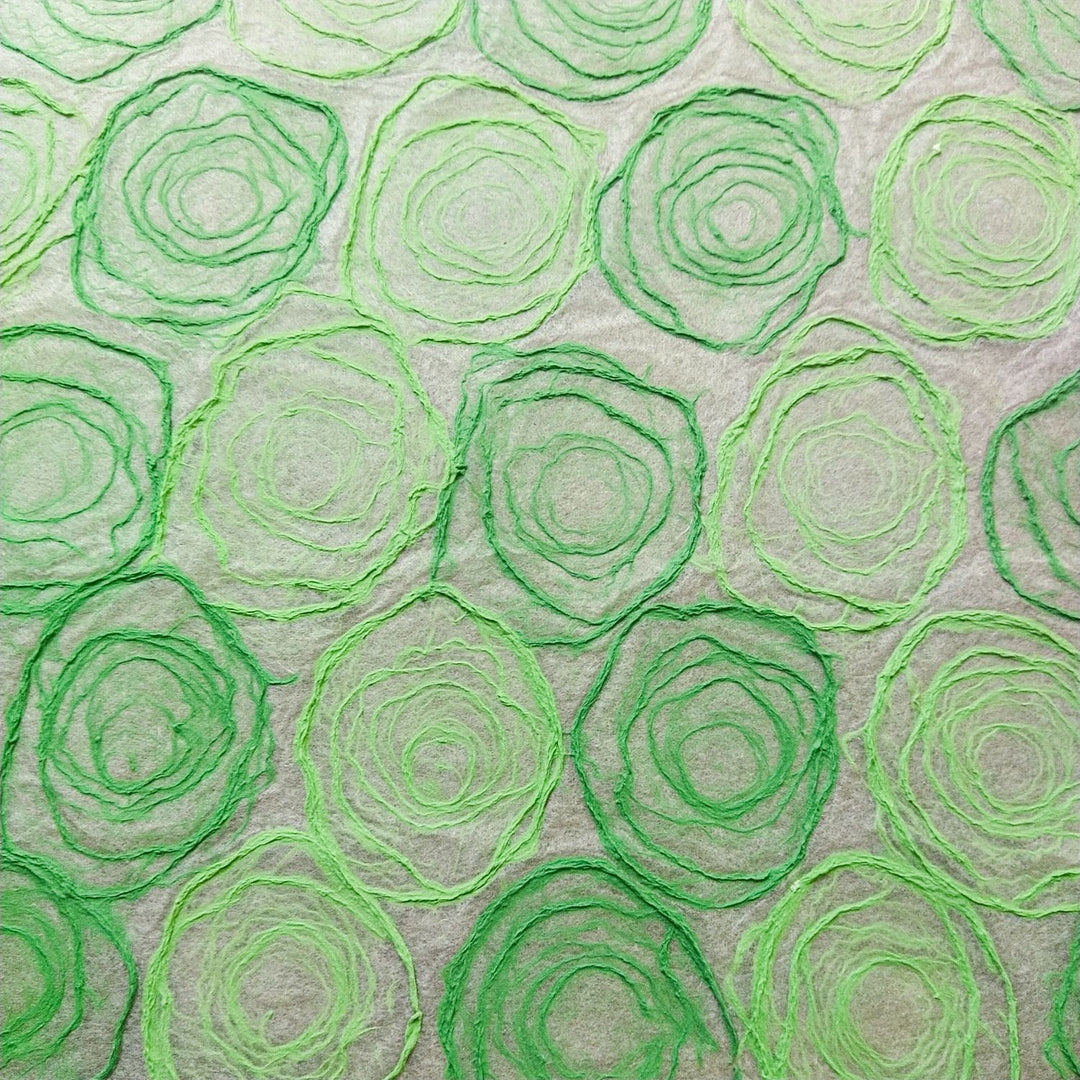 Delicate rose Kozo paper in green tones, handmade by Kozo Studio using mulberry paper techniques, perfect for creative projects needing a touch of natural beauty.