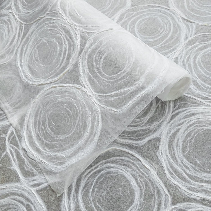 Kozo Studio handmade paper featuring delicate rose designs on translucent mulberry paper, ideal for windows, lamps, and crafts.