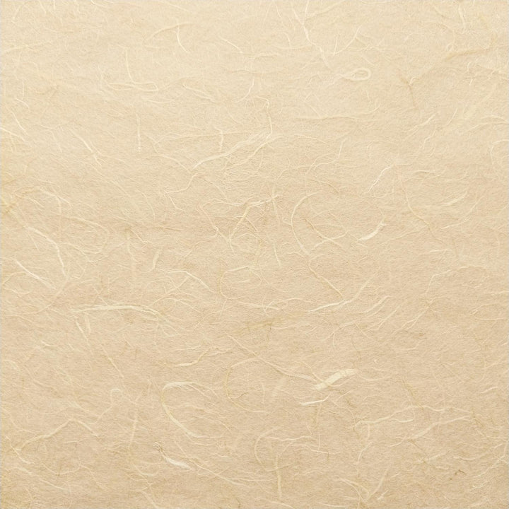 Detailed view of Unryu-style mulberry paper from Kozo Studio showing soft, pale beige tones and intricate handmade paper fibers.