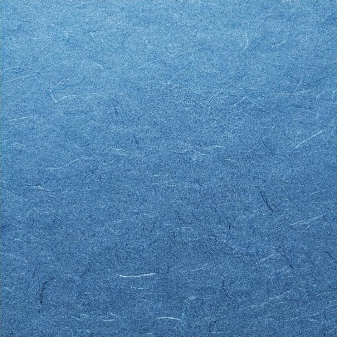 Kozo Studio Unryu paper in cobalt blue showcasing delicate handmade mulberry texture