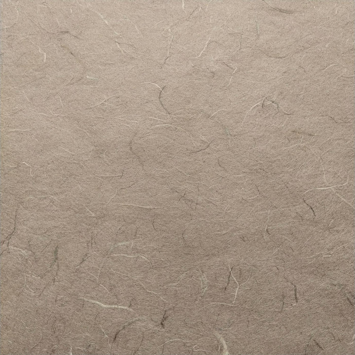 Detailed view of Kozo Studio Unryu mulberry paper in grey, highlighting natural fiber patterns and handmade quality.