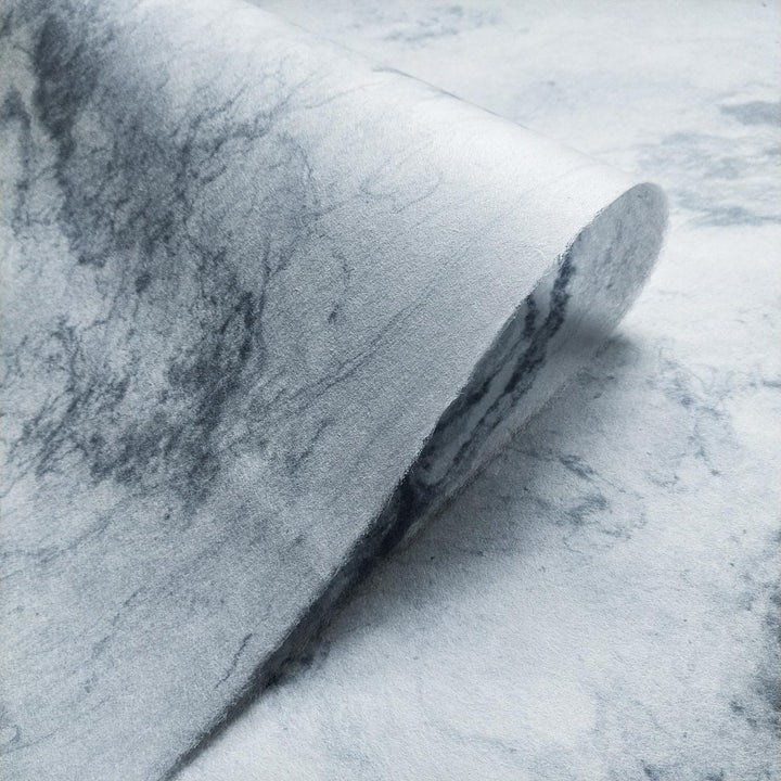The Sky Kozo Paper Design 2 from Kozo Studio showcasing abstract marbled patterns in grey and white on elegant handmade mulberry paper.