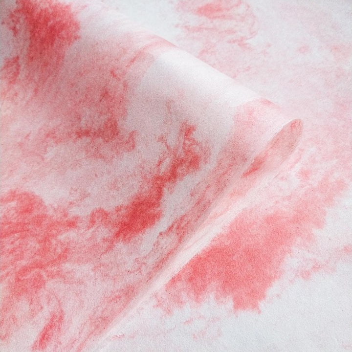 Artistic texture of handmade paper from Kozo Studio, showing Design 3's blend of pink and white organic patterns on mulberry paper.