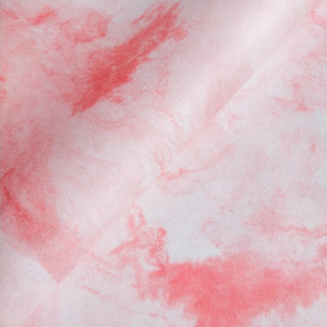 Close-up of Sky Kozo Paper Design 3 by Kozo Studio showing soft pink and white swirls with organic shapes on handmade mulberry paper.