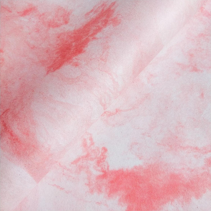 Close-up of Sky Kozo Paper Design 3 by Kozo Studio showing soft pink and white swirls with organic shapes on handmade mulberry paper.