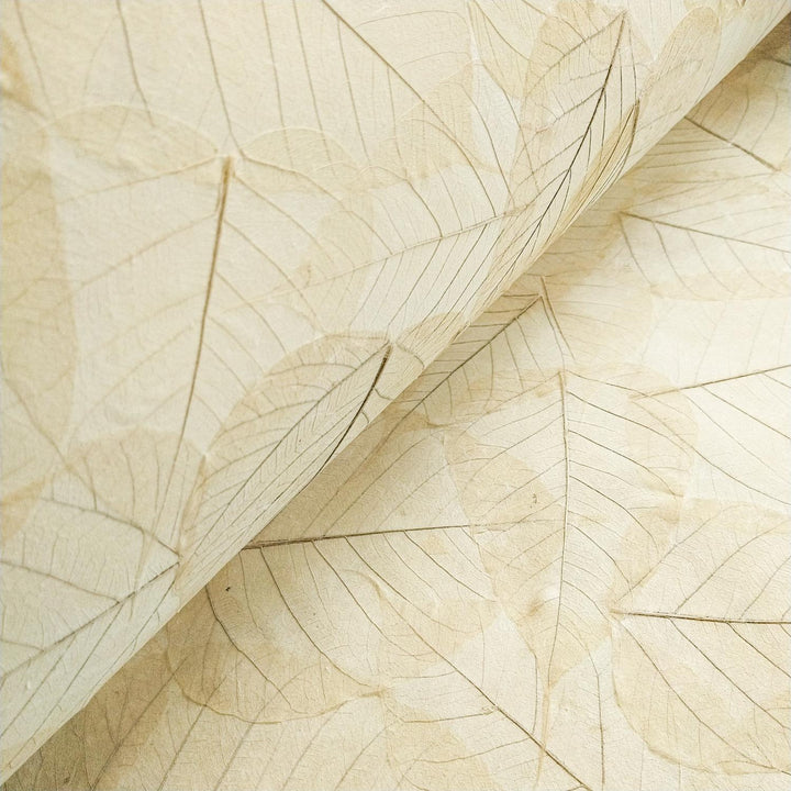 Decorative handmade paper from Kozo Studio made of strong mulberry fibers, highlighted by heart-shaped bodhi leaves, perfect for wrapping, crafting, or display.