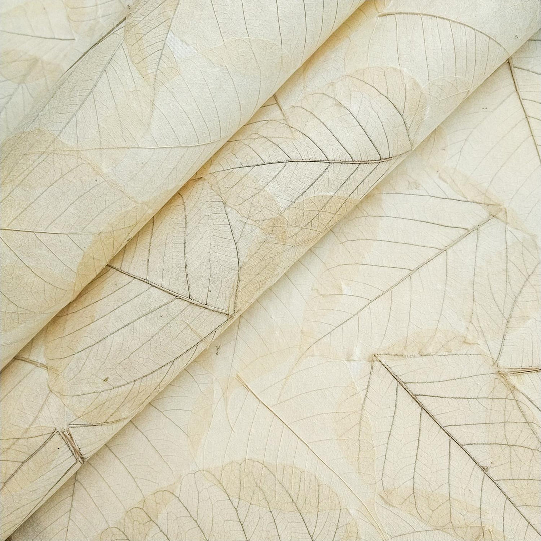 Close-up of mulberry paper from Kozo Studio, decorated with heart-shaped bodhi leaf skeletons for a textured, handmade paper design inspired by traditional Buddhist symbolism.