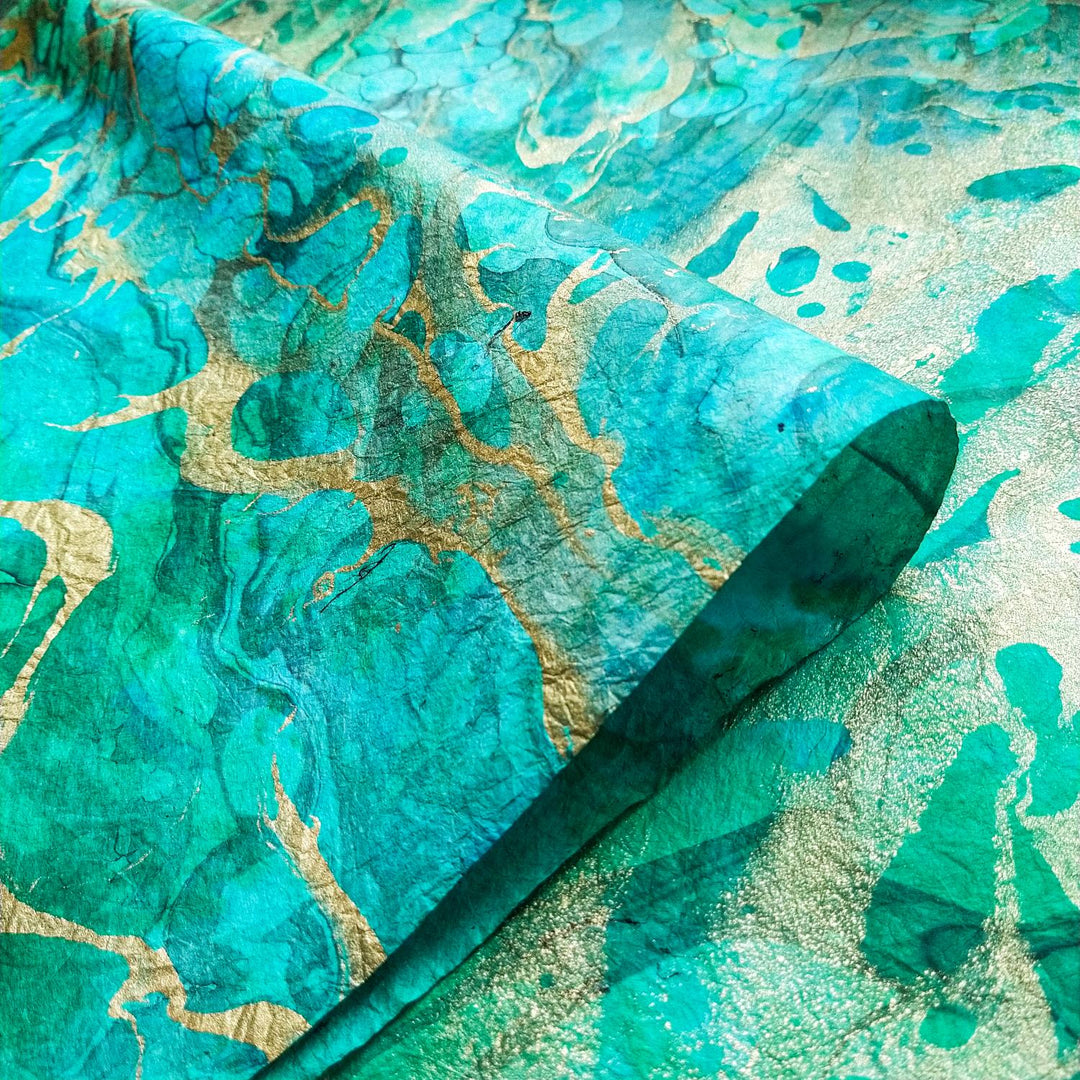 Elegant sheet of marbled mulberry paper from Kozo Studio, designed with oil-based swirls and refined by handmade techniques.