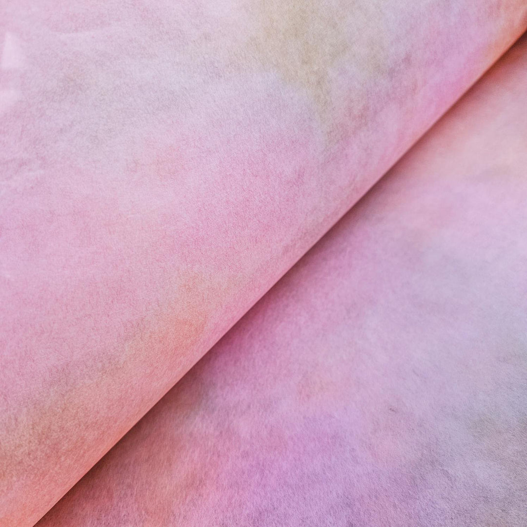 A detailed shot of Kozo Studio's handmade Ombre mulberry paper in soft pastel tones, perfect for scrapbooking, lampshades, and elegant home décor.