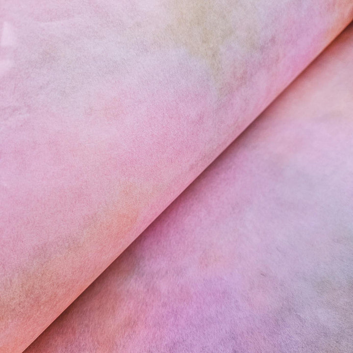 A detailed shot of Kozo Studio's handmade Ombre mulberry paper in soft pastel tones, perfect for scrapbooking, lampshades, and elegant home décor.