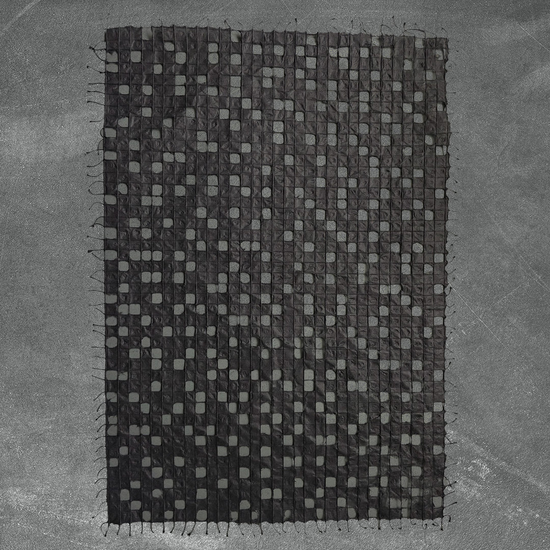 Handmade Kobe Kozo Mulberry Paper (Black) by Kozo Studio in full sheet format on grey background.