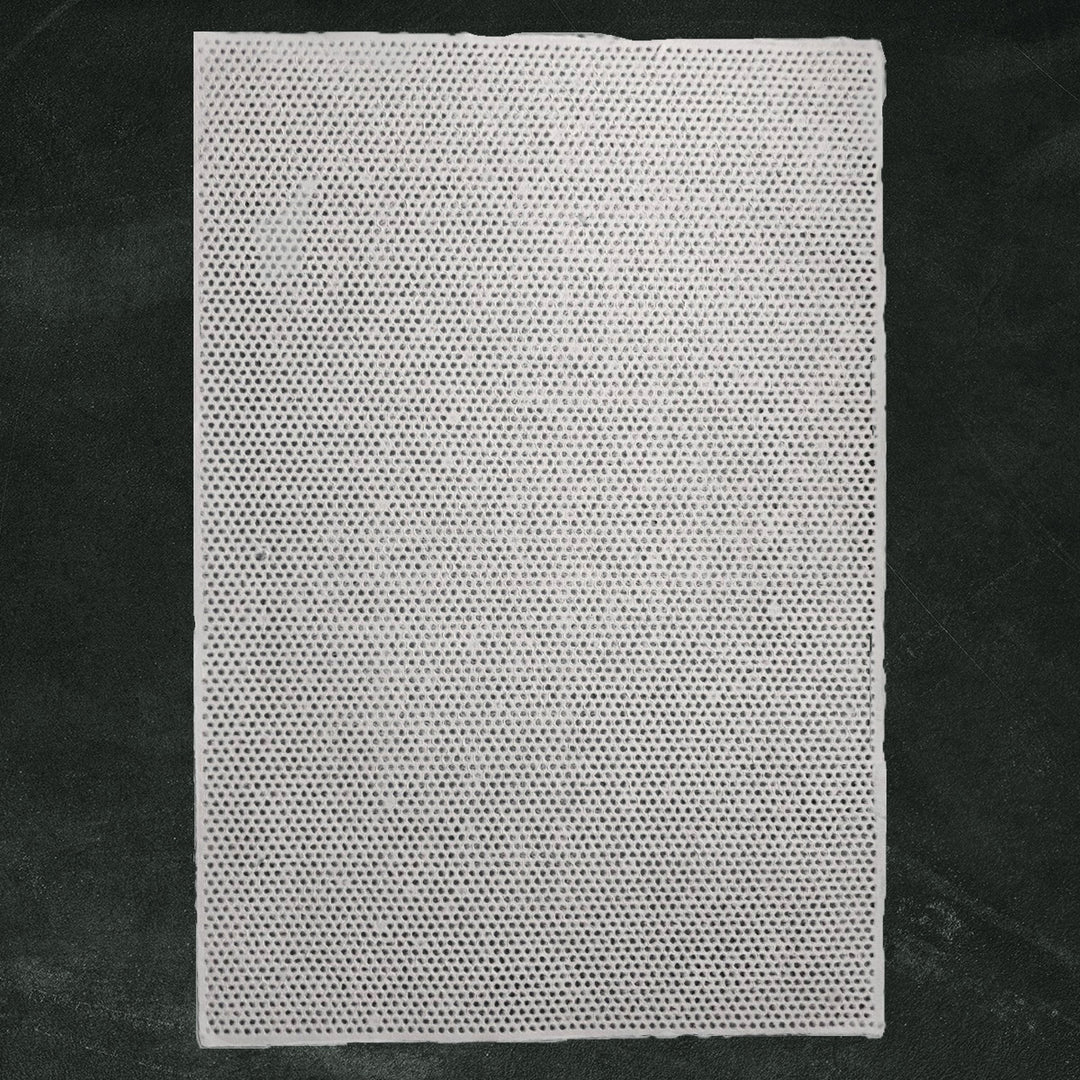 Close-up of Rakusui Technique on Handmade Paper by Kozo Studio – A fine example of mulberry paper crafted with the Rakusui method, showcasing intricate lace dots and translucent texture.