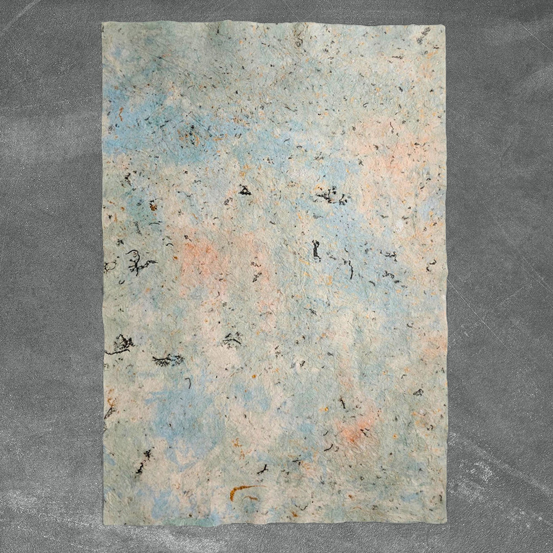 A sheet of Milano Kozo Paper by Kozo Studio, showcasing handmade mulberry paper with a crinkled marble design, ideal for decorative or artistic use.