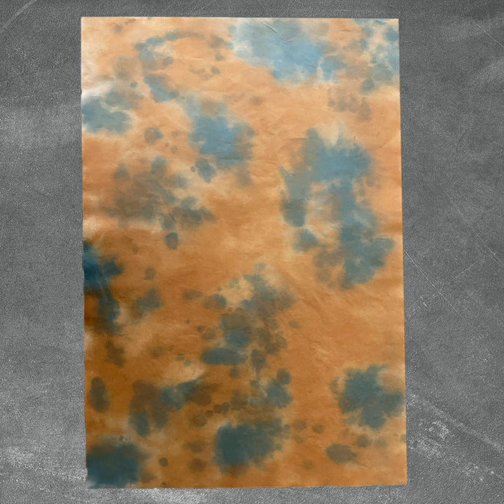 Kozo Studio's handmade paper sheet in #6 Woodland Overcast, showcasing an ombre effect of earthy greens and browns on premium mulberry paper.
