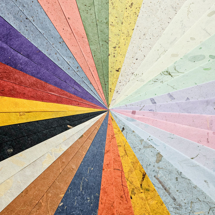 Kozo Studio’s Assorted A4 Mix Leaf & Flower Mulberry Paper Set (40 Sheets) features vibrant, textured sheets in various colors and patterns, arranged in a fan-like burst—ideal for inspiring your next DIY craft.