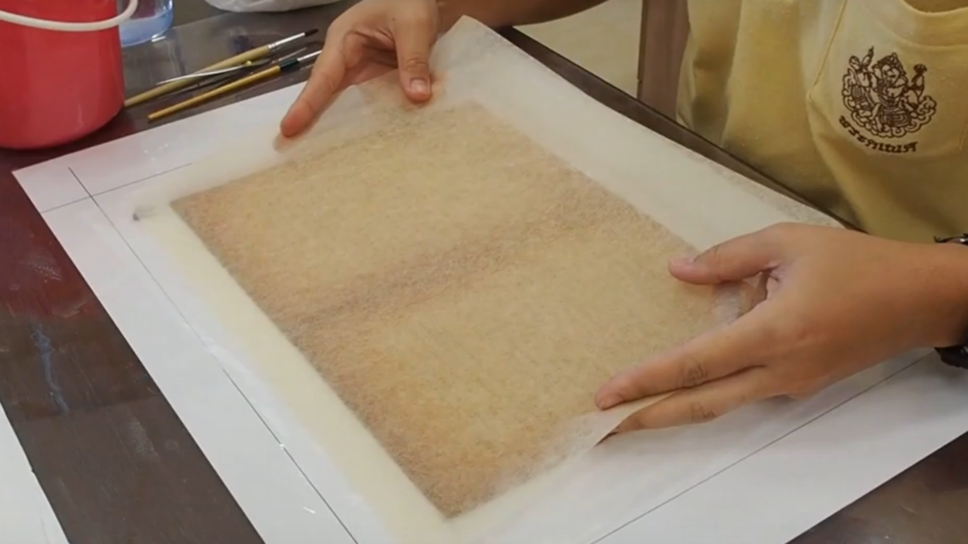 Attaching_a_layer_of_extra_thin_kozo_paper.png