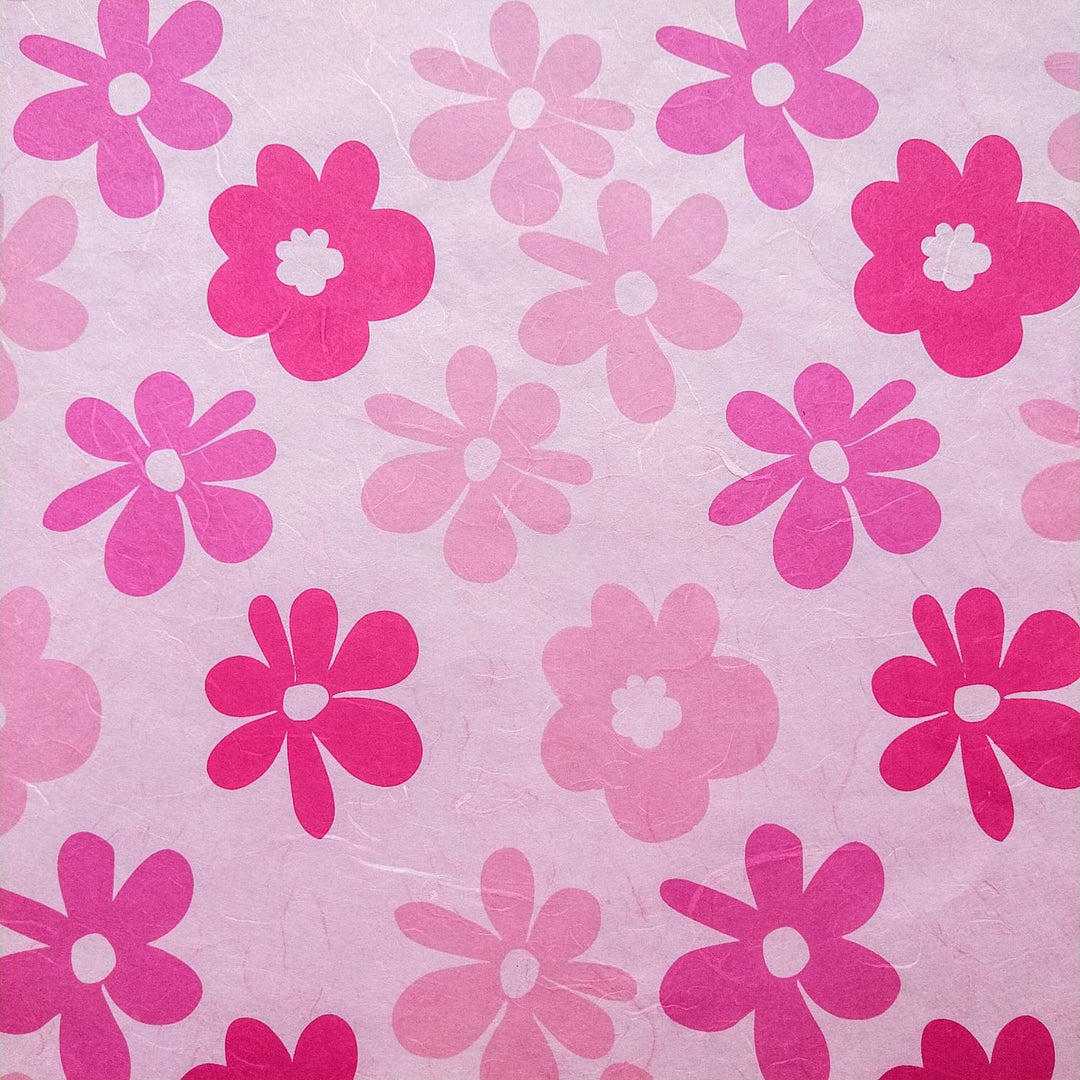 Bright pink and fuchsia flowers on Caribbean-themed mulberry paper, screen-printed by Kozo Studio using traditional handmade paper techniques.