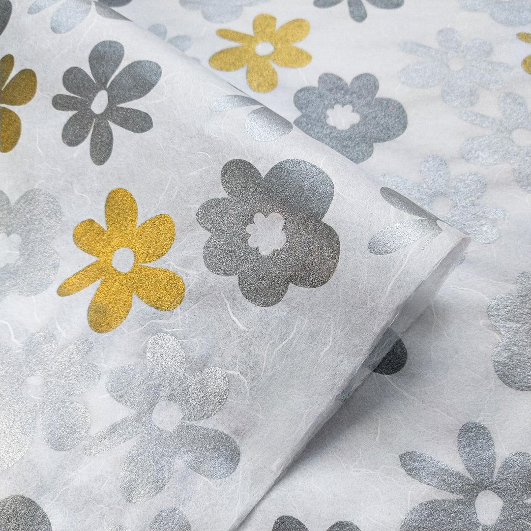 Artistic floral design printed on white mulberry paper by Kozo Studio, highlighting the handmade texture and Caribbean inspiration behind this unique kozo paper.