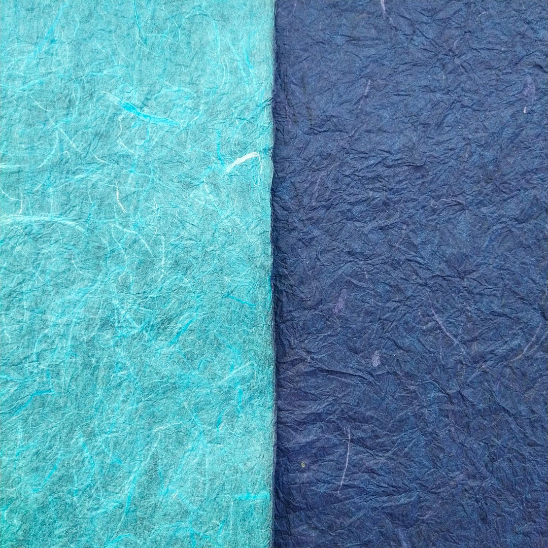 Detail view of crinkled handmade paper from Kozo Studio, highlighting the fibrous texture and dual-color design of premium Momigami mulberry paper.