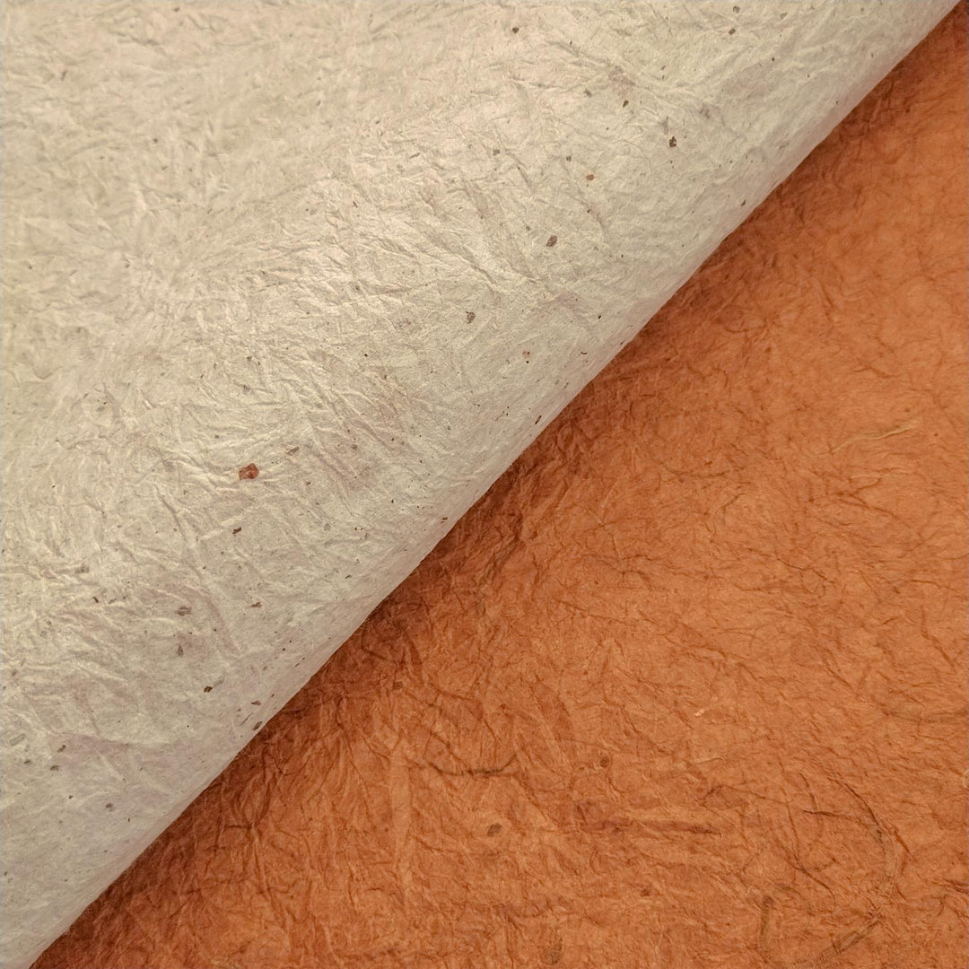 Textured and dimensional, this Kozo Studio double-sided handmade paper blends natural and brown colors in a curled composition perfect for artistic inspiration.