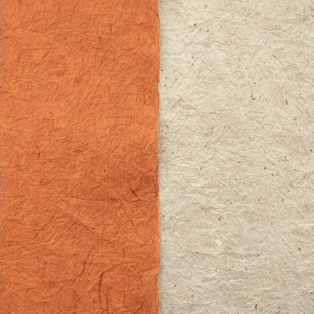 A close-up of handmade paper by Kozo Studio showcases the dual textures and earthy hues of their crinkled double-sided mulberry paper.