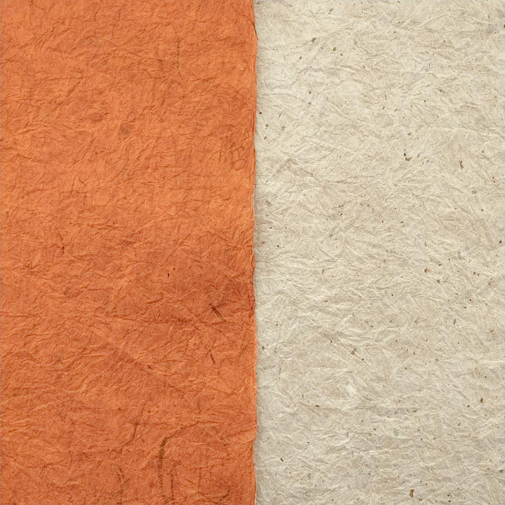 A close-up of handmade paper by Kozo Studio showcases the dual textures and earthy hues of their crinkled double-sided mulberry paper.