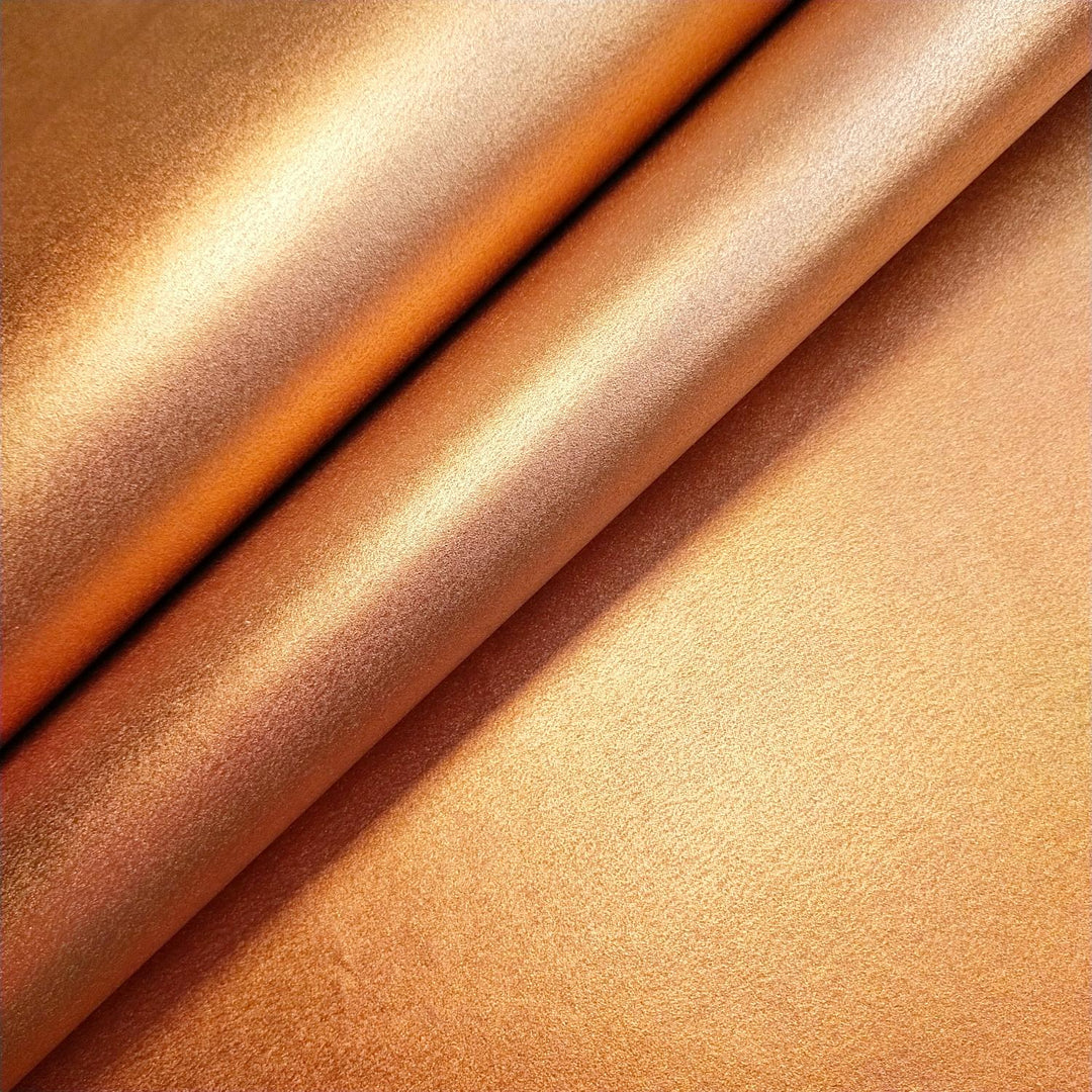 Gleaming copper handmade paper created by Kozo Studio, made from kozo fibers with a silky metallic finish and elegant look.