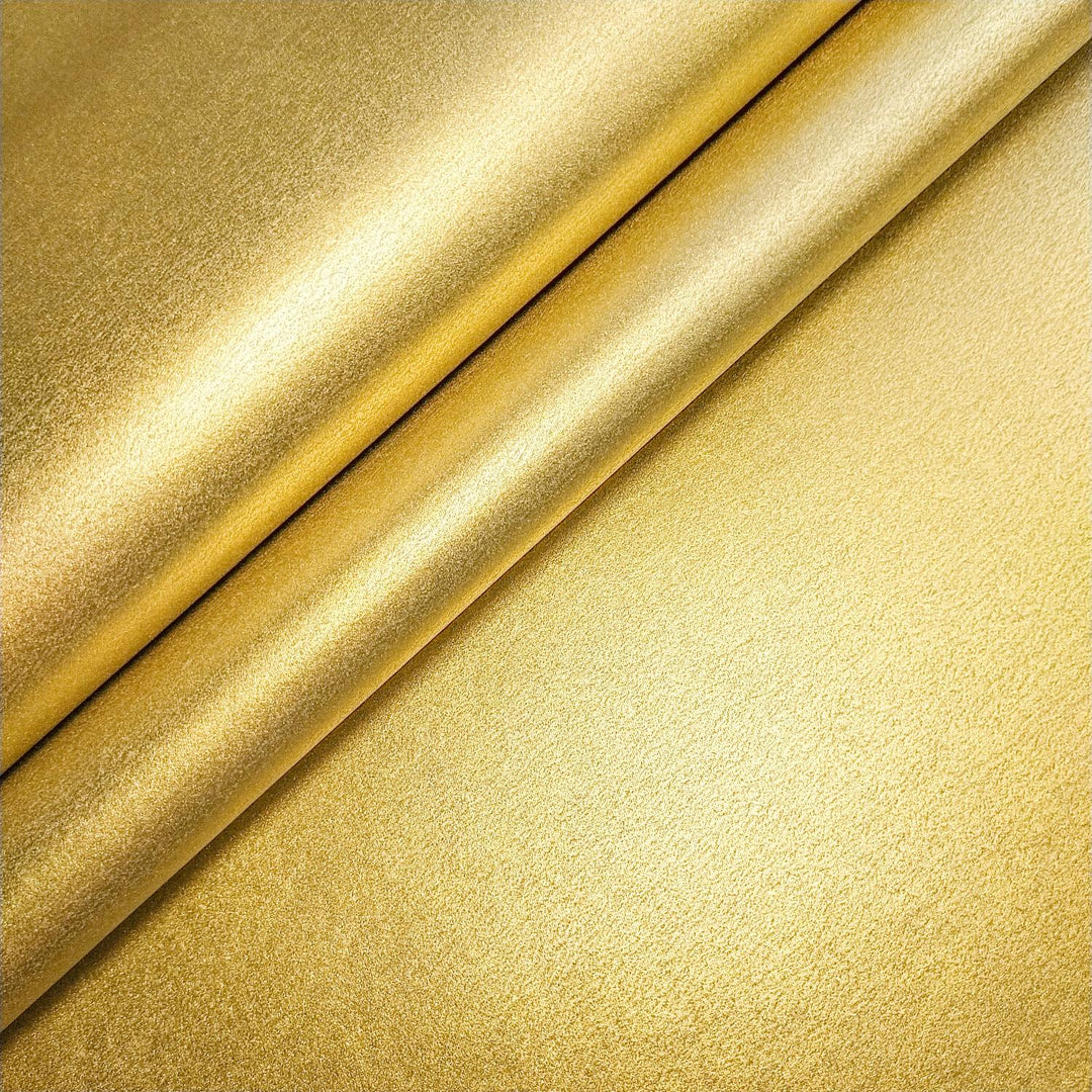 Golden mulberry paper with metallic sheen and handmade kozo texture, perfect for crafts and design, created by Kozo Studio.