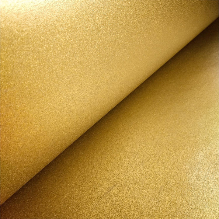 Luxurious handmade paper made from kozo, featuring a gleaming gold finish and rich mulberry paper texture by Kozo Studio.