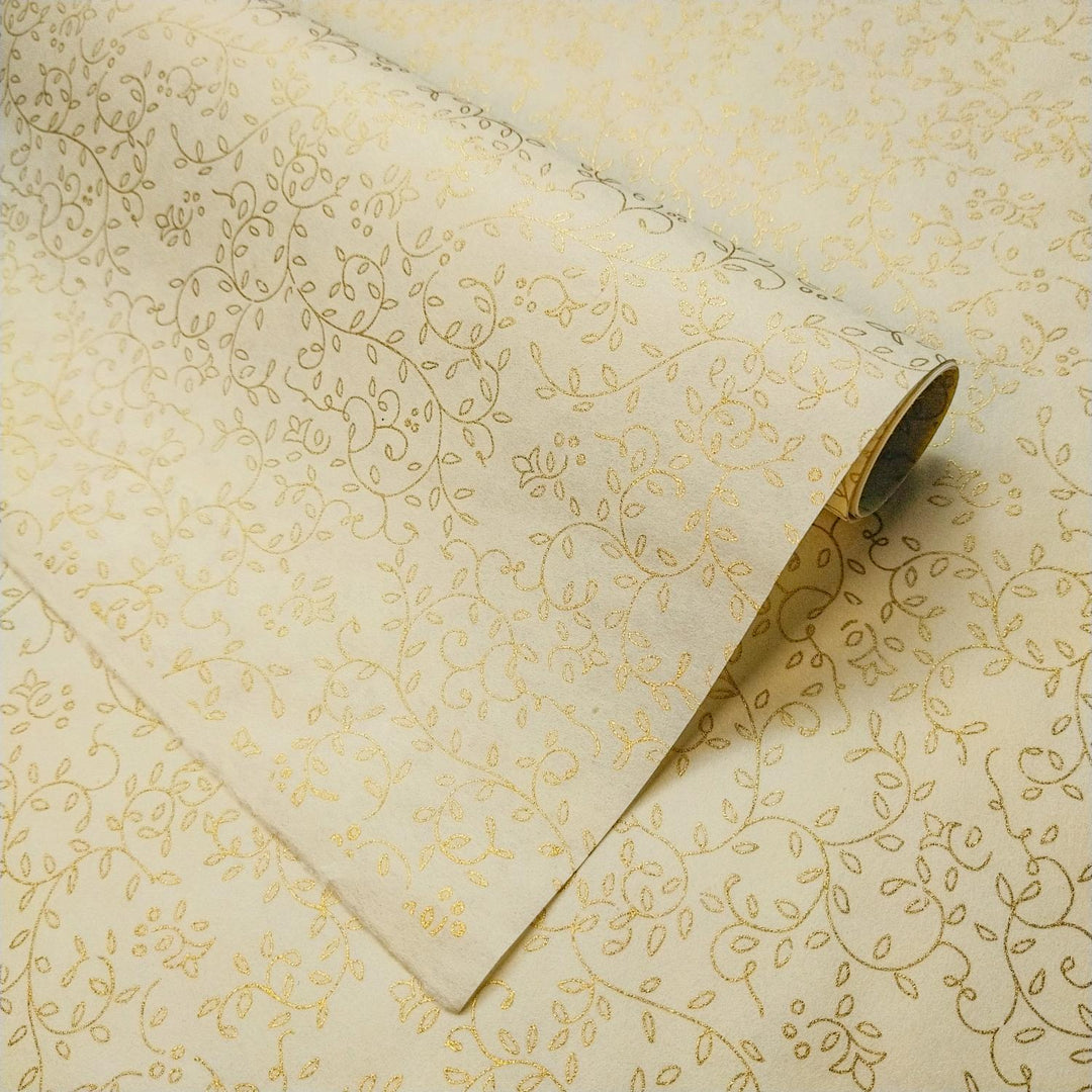 Unrolled Grapevine Screen-printed handmade paper from Kozo Studio featuring gold floral patterns on ivory mulberry paper with intricate vines and leaves.