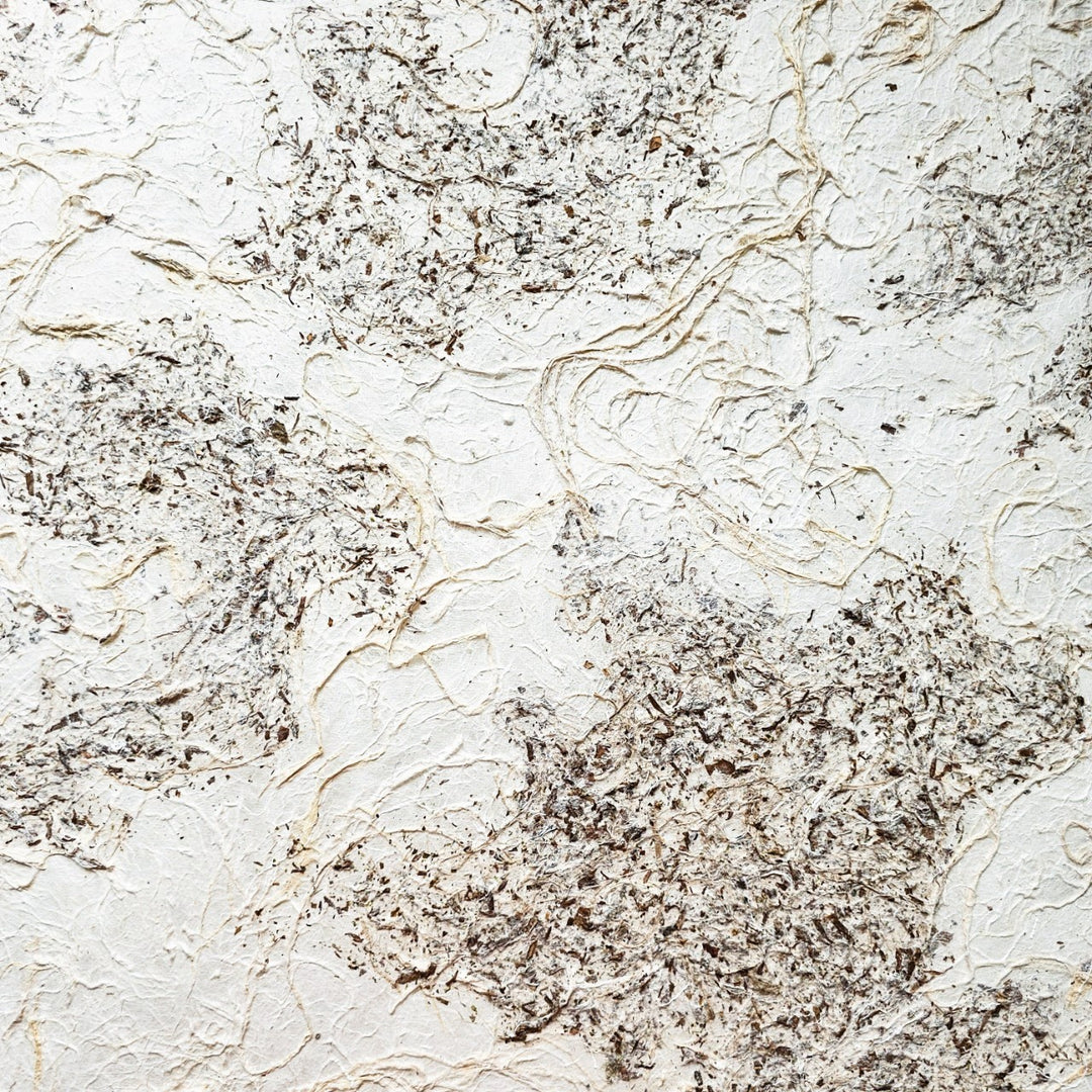 Organic and textured handmade paper from Kozo Studio, made of mulberry fibers with natural color variation and ideal for creative, decorative use.