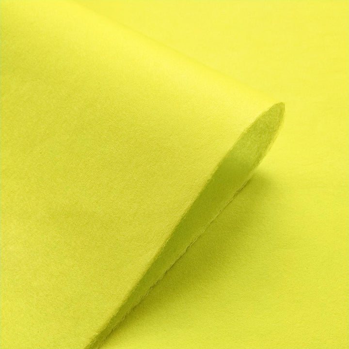 Detailed view of Kozo Studio Limeade handmade paper made from mulberry fibers, showing a smooth texture and soft finish.