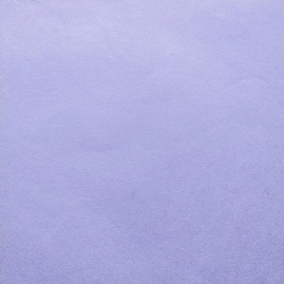 Image of heather purple Kozo Studio paper made from mulberry fibers, showcasing the artisanal finish of handmade paper.