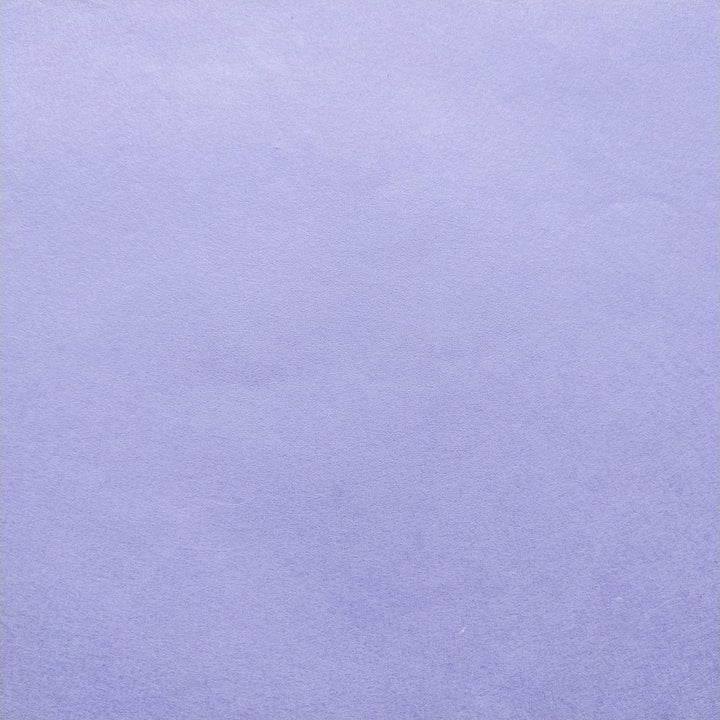 Image of heather purple Kozo Studio paper made from mulberry fibers, showcasing the artisanal finish of handmade paper.