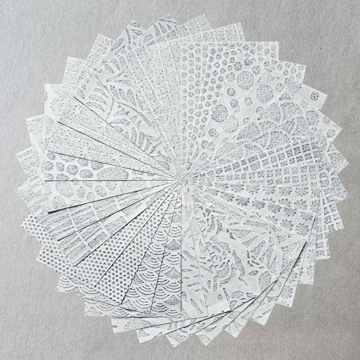 30-sheet pack of handmade mulberry paper from Kozo Studio showcasing acid-free, non-yellowing Rakusui designs perfect for paper crafting.