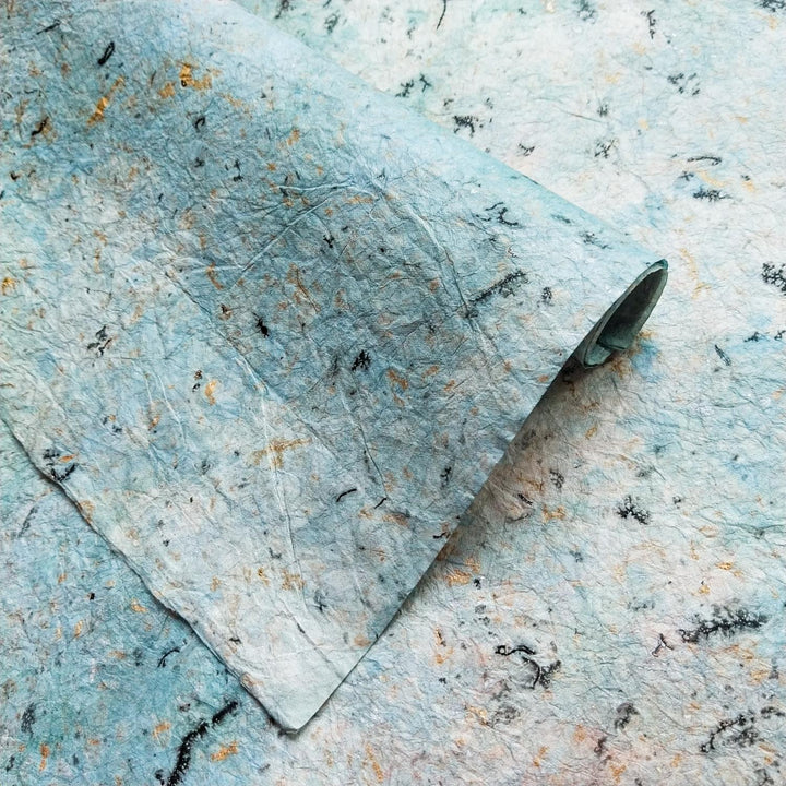 Close-up of handmade paper from Kozo Studio made with mulberry paper, featuring Design 1 of Milano Kozo Paper with a soft, textured marbled pattern.