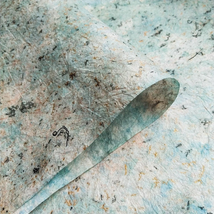 Marbled mulberry paper with a crumpled, fabric-inspired surface. ,Handcrafted at Kozo Studio.