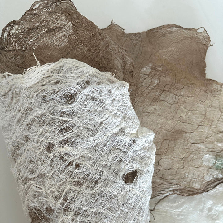 Premium mulberry bark sheet by Kozo Studio, featuring flexible, hand-processed fibers with natural holes and unique texture variations.