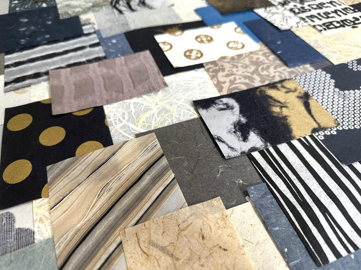 Image of a 100-piece Kozo Studio mulberry paper set, filled with handmade paper textures in elegant blue, white, and gold tones. Designed for scrapbooking, paper crafts, and mixed media artwork.