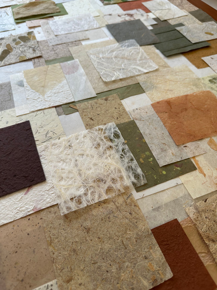 Handmade mulberry paper scraps from Kozo Studio's Garden Grove pack, showcasing leaf designs and earthy fibers.
