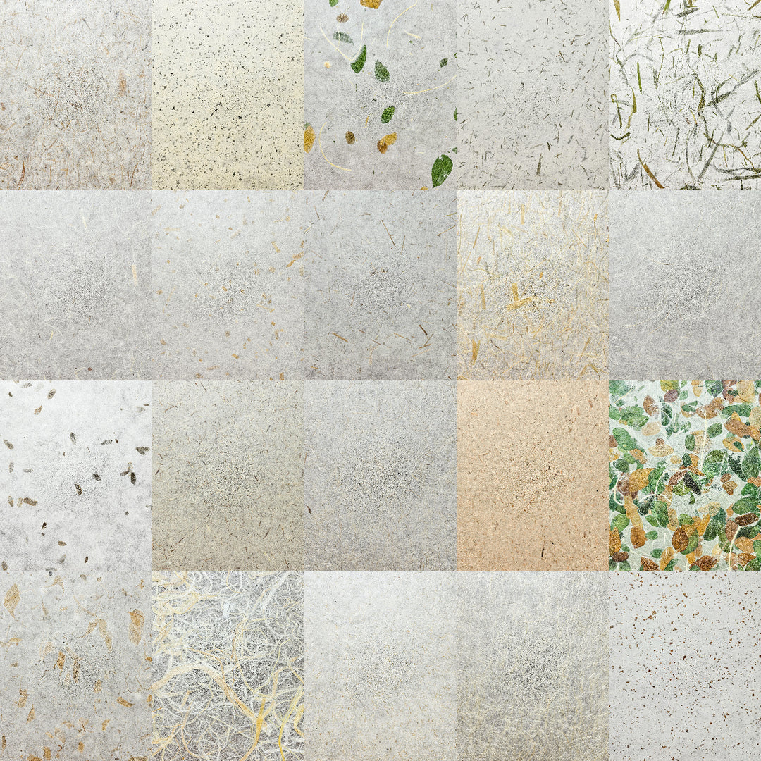 Close-up of a textured 40-sheet mulberry paper pack by Kozo Studio, showcasing handmade paper varieties such as Unryu with mulberry bark, Kinwashi, and rice straw confetti designs.