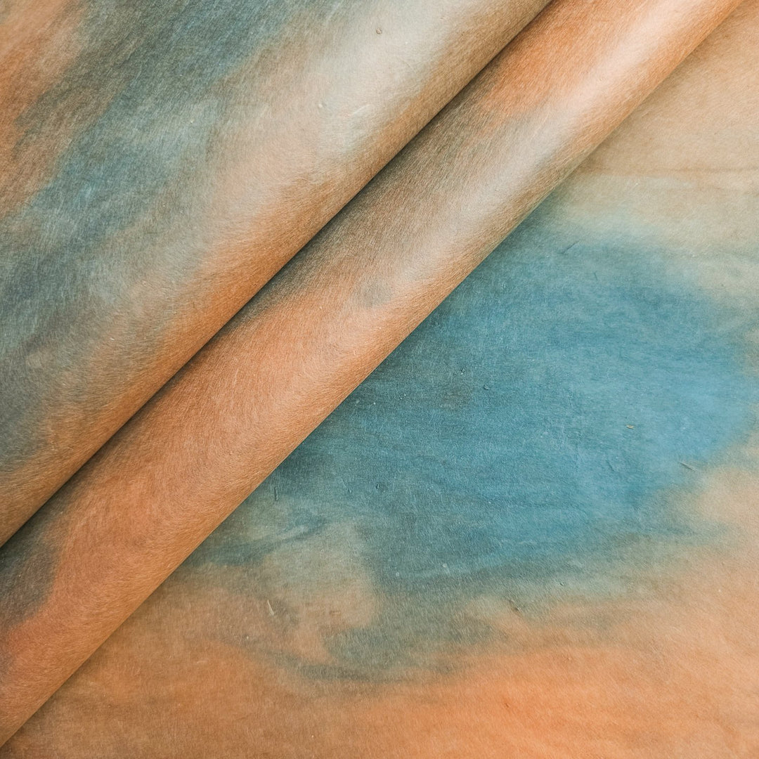 Handmade Ombre Mulberry Paper from Kozo Studio featuring green and brown watercolor gradients on a rectangular sheet, ideal for creative design projects.